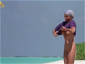 fabulous Bo Derek showing off her unshaved cunt at the beach